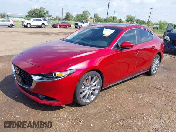 2024 Mazda 3 S Preferred with VIN 3MZBPACM3RM402675, listed as a IAAI auction lot 42612224 with 14,244 mi miles and . Bid and sale history available at DreamBid. Image 2.