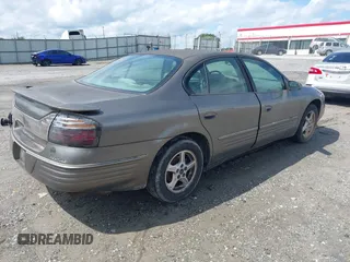 2001 Pontiac Bonneville SE z VIN 1G2HX54K514263686, wystawiony jako IAAI lot #42373637 z przebiegiem Nie podano mil oraz . Historia ofert i sprzedaży dostępna na DreamBid. Obrazek 4.