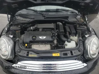 2013 MINI Hardtop z VIN WMWSU3C56DT689582, wystawiony jako Copart lot #58364685 z przebiegiem Nie podano mil oraz Szkoda całkowita • Salvage title. Historia ofert i sprzedaży dostępna na DreamBid. Obrazek 11.