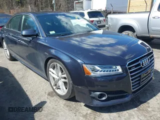 2016 Audi A8 L 4.0T Sport with VIN WAU43AFD1GN022253, listed as a IAAI auction lot 41858053 with 219,517 mi miles. Bid and sale history available at carsss.com. Image 1.