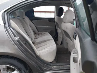 2009 Kia Optima LX with VIN KNAGE228995306982, listed as a IAAI auction lot 41898377 with 197,604 mi miles. Bid and sale history available at carsss.com. Image 8.