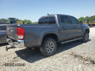 2017 Toyota Tacoma SR5 with VIN 5TFAZ5CN9HX042524, listed as a Copart auction lot 52423715 with 87,352 mi miles and Salvage Title. Bid and sale history available at DreamBid. Image 3.