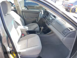 2004 Toyota Camry LE with VIN 4T1BF30K94U577260, listed as a IAAI auction lot 41906287 with 68,499 mi miles. Bid and sale history available at carsss.com. Image 5.
