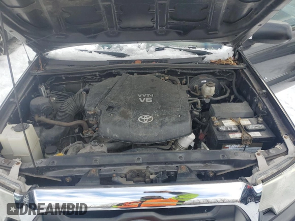 2013 Toyota Tacoma z VIN 5TFUU4EN2DX052230, wystawiony jako Copart lot #43802675 z przebiegiem 102 410 mil mil oraz Szkoda całkowita • Salvage title. Historia ofert i sprzedaży dostępna na DreamBid. Obrazek 11.