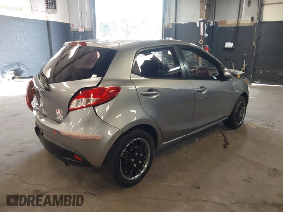 2012 Mazda 2 Sport with VIN JM1DE1KY7C0150803, listed as a IAAI auction lot 41932409 with 89,474 mi miles. Bid and sale history available at carsss.com. Image 4.