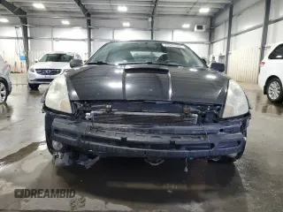 2003 Toyota Celica GT with VIN JTDDR32T130147979, listed as a Copart auction lot 79541304 with 258,540 mi miles and Clean Title. Bid and sale history available at carsss.com. Image 5.