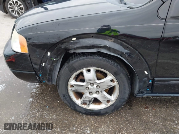 2007 Ford Freestyle Limited with VIN 1FMZK06187GA00892, listed as a IAAI auction lot 41894153 with 159,424 mi miles and . Bid and sale history available at DreamBid. Image 6.