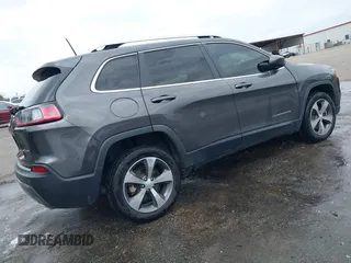 2020 Jeep Cherokee Limited with VIN 1C4PJLDN0LD552064, listed as a IAAI auction lot 41567994 with 74,816 mi miles. Bid and sale history available at carsss.com. Image 4.