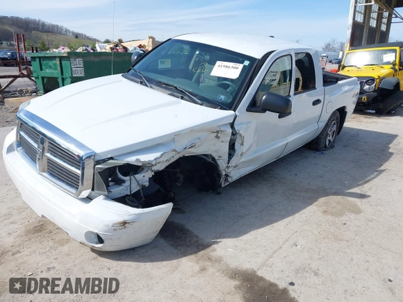 2006 Dodge Dakota SLT z VIN 1D7HW48K06S676241, wystawiony jako IAAI lot #41986300 z przebiegiem 112 215 mil mil oraz . Historia ofert i sprzedaży dostępna na DreamBid. Obrazek 2.