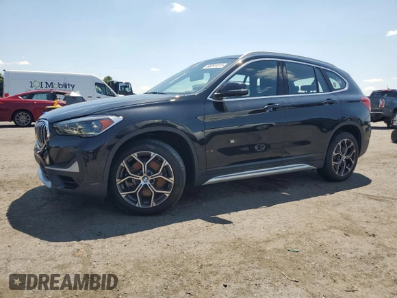 2021 BMW X1 xDrive28i with VIN WBXJG9C06M5S33201, listed as a Copart auction lot 66391015 with 53,395 mi miles and Salvage title. Bid and sale history available at DreamBid. Image 1.