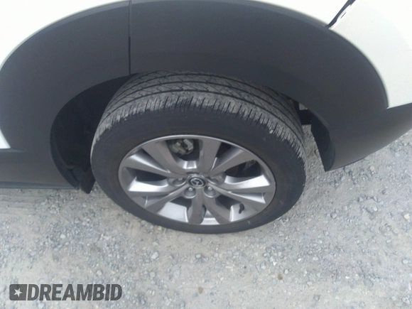 2021 Mazda CX-30 Premium with VIN 3MVDMADL5MM318729, listed as a IAAI auction lot 41645560 with 51,132 mi miles and . Bid and sale history available at DreamBid. Image 12.