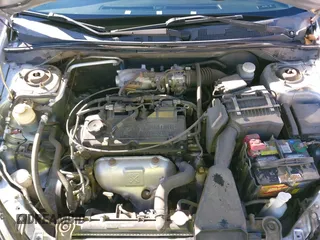 2006 Mitsubishi Lancer ES with VIN JA3AJ26E06U057959, listed as a IAAI auction lot 41347649 with 122,963 mi miles. Bid and sale history available at carsss.com. Image 10.