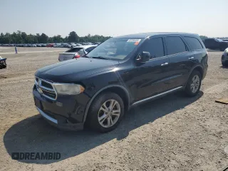2012 Dodge Durango SXT with VIN 1C4RDJAG0CC104388, listed as a Copart auction lot 62266465 with 256,264 mi miles and Clean title. Bid and sale history available at DreamBid. Image 1.