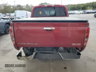 2010 GMC Canyon SLE1 with VIN 1GTJTCDP1A8136659, listed as a Copart auction lot 74568354 with 243,634 mi miles and Salvage Title. Bid and sale history available at carsss.com. Image 6.