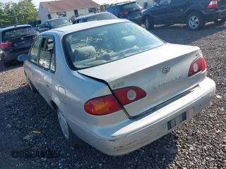 2001 Toyota Corolla CE with VIN 2T1BR12E61C473602, listed as a IAAI auction lot 42408733 with Not provided miles and . Bid and sale history available at DreamBid. Image 3.