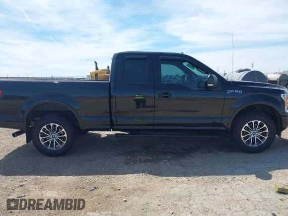 2018 Ford F-150 XL with VIN 1FTEX1EP7JFC21008, listed as a IAAI auction lot 42072145 with 102,679 mi miles and . Bid and sale history available at DreamBid. Image 13.