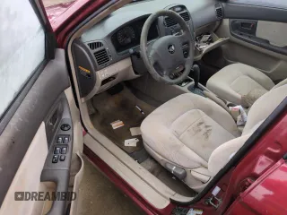 2006 Kia Spectra EX with VIN KNAFE121765251050, listed as a Copart auction lot 75120624 with 0 mi miles and Salvage Title. Bid and sale history available at carsss.com. Image 8.