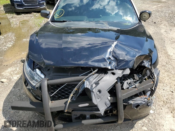 2018 Ford Police Interceptor with VIN 1FAHP2MK4JG140847, listed as a Copart auction lot 60397585 with 58,905 mi miles and Salvage title. Bid and sale history available at DreamBid. Image 11.
