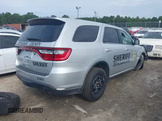 2023 Dodge Durango Pursuit with VIN 1C4SDJFT5PC629959, listed as a IAAI auction lot 40274866 with 6,877 mi miles and . Bid and sale history available at DreamBid. Image 4.