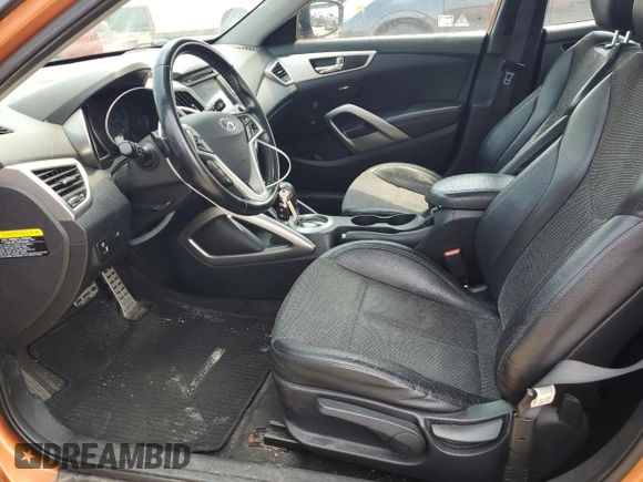 2014 Hyundai Veloster with VIN KMHTC6AD2EU215805, listed as a Copart auction lot 57909825 with 113,004 mi miles and Clean title. Bid and sale history available at DreamBid. Image 7.
