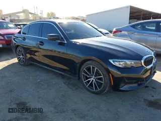 2020 BMW 3 Series 330i with VIN 3MW5R1J01L8B35673, listed as a IAAI auction lot 41583862 with 40,999 mi miles. Bid and sale history available at carsss.com. Image 1.