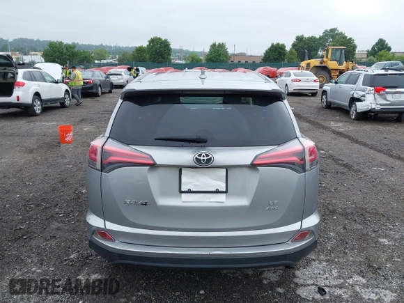 2018 Toyota RAV4 LE with VIN JTMBFREV8JJ200930, listed as a IAAI auction lot 42524876 with 88,015 mi miles and . Bid and sale history available at DreamBid. Image 17.