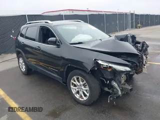 2015 Jeep Cherokee Latitude with VIN 1C4PJLCB9FW737360, listed as a IAAI auction lot 41939681 with 226,603 mi miles and . Bid and sale history available at carsss.com. Image 1.