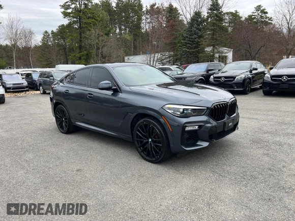 2021 BMW X6 sDrive40i z VIN 5UXCY4C05M9H19479, wystawiony jako Copart lot #54268205 z przebiegiem 85 899 mil mil oraz Czysty tytuł • Clean title. Historia ofert i sprzedaży dostępna na DreamBid. Obrazek 1.