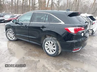 2016 Acura RDX with VIN 5J8TB4H38GL015305, listed as a IAAI auction lot 41672385 with 121,623 mi miles. Bid and sale history available at carsss.com. Image 3.