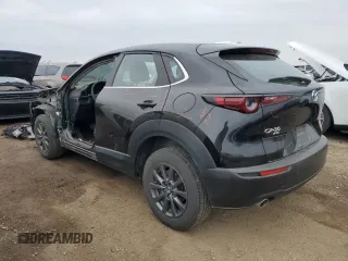 2023 Mazda CX-30 S with VIN 3MVDMBAM6PM549095, listed as a Copart auction lot 53027665 with 53,804 mi miles and Salvage title. Bid and sale history available at DreamBid. Image 2.