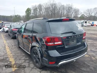 2019 Dodge Journey Crossroad with VIN 3C4PDCGGXKT717700, listed as a IAAI auction lot 41519645 with 105,985 mi miles and . Bid and sale history available at DreamBid. Image 3.