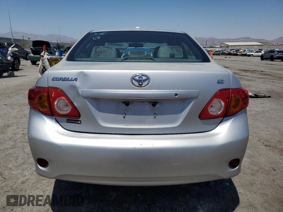 2010 Toyota Corolla with VIN 1NXBU4EEXAZ233494, listed as a Copart auction lot 64494725 with 129,452 mi miles and Salvage title. Bid and sale history available at DreamBid. Image 6.