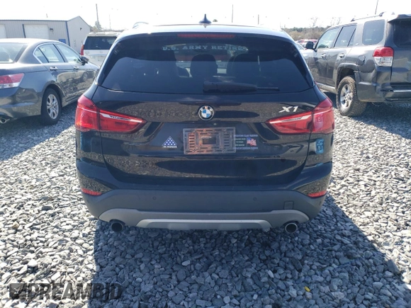 2016 BMW X1 xDrive28i z VIN WBXHT3C3XGP888701, wystawiony jako Copart lot #51409205 z przebiegiem 94 713 mil mil oraz Szkoda całkowita • Salvage title. Historia ofert i sprzedaży dostępna na DreamBid. Obrazek 6.