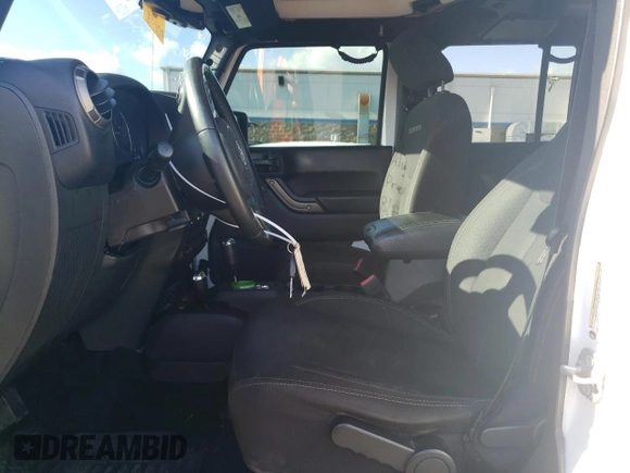 2018 Jeep Wrangler JK Unlimited Sport S with VIN 1C4BJWDG2JL913150, listed as a Copart auction lot 79956974 with 86,153 mi miles and Salvage Title. Bid and sale history available at carsss.com. Image 7.