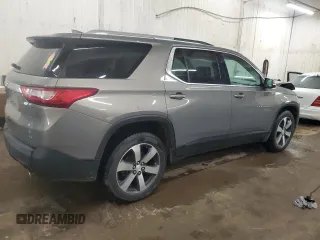 2018 Chevrolet Traverse LT z VIN 1GNEVHKW9JJ124245, wystawiony jako Copart lot #57029805 z przebiegiem 157 694 mil mil oraz Szkoda całkowita • Salvage title. Historia ofert i sprzedaży dostępna na DreamBid. Obrazek 3.