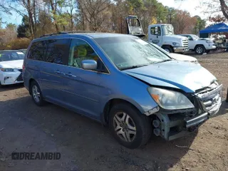 2005 Honda Odyssey EX-L with VIN 5FNRL38695B090766, listed as a IAAI auction lot 41075706 with 271,941 mi miles and . Bid and sale history available at DreamBid. Image 1.