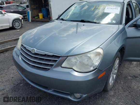 2010 Chrysler Sebring Limited with VIN 1C3CC5FDXAN161928, listed as a IAAI auction lot 42762581 with 182,795 mi miles and . Bid and sale history available at DreamBid. Image 6.