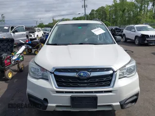 2018 Subaru Forester z VIN JF2SJABC5JH444739, wystawiony jako IAAI lot #42123918 z przebiegiem 124 520 mil mil oraz . Historia ofert i sprzedaży dostępna na DreamBid. Obrazek 13.