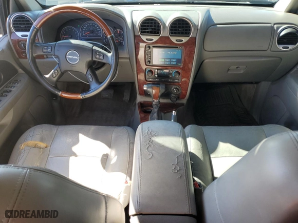2006 GMC Envoy Denali with VIN 1GKES63M562342854, listed as a Copart auction lot 47077205 with 194,704 mi miles and Clean Title. Bid and sale history available at carsss.com. Image 8.