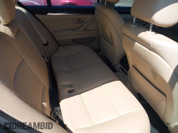 2014 BMW 5 Series 535d with VIN WBAXA5C52ED689410, listed as a IAAI auction lot 42554790 with 136,744 mi miles and . Bid and sale history available at DreamBid. Image 8.