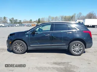 2017 Cadillac XT5 Luxury AWD z VIN 1GYKNDRS6HZ325727, wystawiony jako IAAI lot #41900538 z przebiegiem 132 375 mil mil oraz . Historia ofert i sprzedaży dostępna na DreamBid. Obrazek 14.