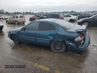 2002 Pontiac Grand Am SE z VIN 1G2NE52F92C172605, wystawiony jako Copart lot #56541555 z przebiegiem 164 600 mil mil oraz Szkoda całkowita • Salvage title. Historia ofert i sprzedaży dostępna na DreamBid. Obrazek 2.