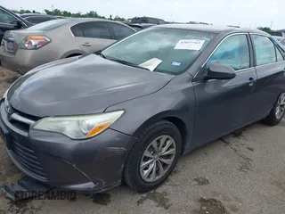 2015 Toyota Camry XLE with VIN 4T4BF1FK1FR446697, listed as a IAAI auction lot 42077763 with 119,278 mi miles and . Bid and sale history available at DreamBid. Image 2.