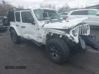 2018 Jeep Wrangler Unlimited Sahara z VIN 1C4HJXEG7JW186147, wystawiony jako IAAI lot #41735194 z przebiegiem 168 521 mil mil oraz . Historia ofert i sprzedaży dostępna na DreamBid. Obrazek 1.