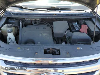 2014 Ford Edge SEL z VIN 2FMDK4JC7EBA36345, wystawiony jako Copart lot #53434145 z przebiegiem 184 955 mil mil oraz Szkoda całkowita • Salvage title. Historia ofert i sprzedaży dostępna na DreamBid. Obrazek 12.