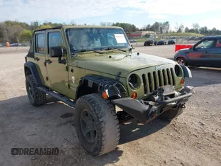 2013 Jeep Wrangler Unlimited Sport z VIN 1C4BJWDG5DL577949, wystawiony jako IAAI lot #41837172 z przebiegiem 142 235 mil mil oraz . Historia ofert i sprzedaży dostępna na DreamBid. Obrazek 1.