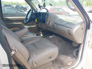 1996 Chevrolet Tahoe with VIN 1GNEK13R4TJ340094, listed as a IAAI auction lot 42044326 with 178,418 mi miles. Bid and sale history available at carsss.com. Image 5.
