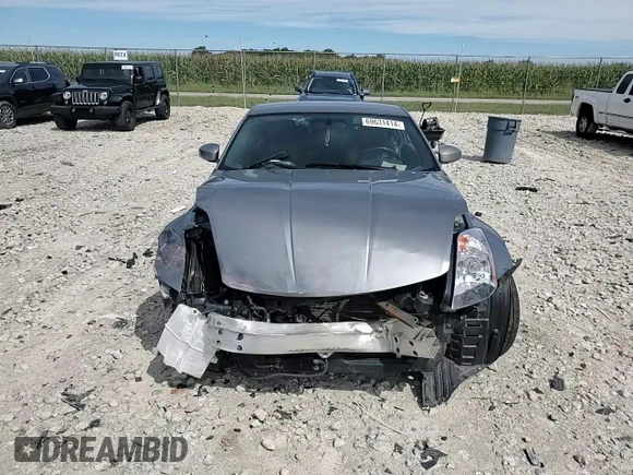 2005 Nissan 350Z with VIN JN1AZ34D05M606703, listed as a Copart auction lot 69631414 with 133,519 mi miles and Salvage Title. Bid and sale history available at DreamBid. Image 10.
