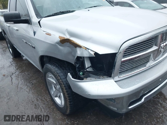 2012 Ram 1500 Big Horn z VIN 1C6RD6GT3CS224300, wystawiony jako IAAI lot #40807733 z przebiegiem 145 495 mil mil oraz . Historia ofert i sprzedaży dostępna na DreamBid. Obrazek 6.