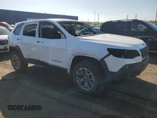 2022 Jeep Cherokee Trailhawk with VIN 1C4PJMBX1ND524383, listed as a Copart auction lot 56370805 with 25,145 mi miles and Salvage title. Bid and sale history available at DreamBid. Image 4.